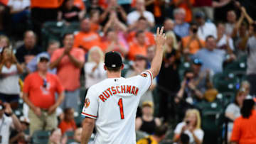 Jun 25, 2019; Baltimore, MD, USA; Baltimore Orioles first round draft pick Adley Rutschman waves to the crowd during the fourth inning against the San Diego Padres at Oriole Park at Camden Yards. Mandatory Credit: Tommy Gilligan-USA TODAY Sports