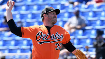 Mar 5, 2021; Dunedin, Florida, USA; Baltimore Orioles pitcher Matt Harvey (32) throws a pitch in the first inning against the Toronto Blue Jays during spring training at TD Ballpark. Mandatory Credit: Jonathan Dyer-USA TODAY Sports