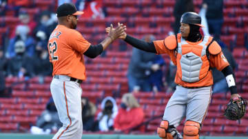 Apr 3, 2021; Boston, Massachusetts, USA; Baltimore Orioles relief pitcher Cesar Valdez (62) is congratulated by catcher Pedro Severino (28) after defeating the Boston Red Sox at Fenway Park. Mandatory Credit: Bob DeChiara-USA TODAY Sports