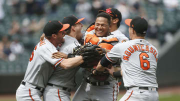May 5, 2021; Seattle, Washington, USA; Baltimore Orioles designated hitter Trey Mancini (16, left), starting pitcher John Means (47, second from left), catcher Pedro Severino (28) and first baseman Ryan Mountcastle (6) celebrate following the final out of a no-hit 6-0 victory against the Seattle Mariners at T-Mobile Park. Mandatory Credit: Joe Nicholson-USA TODAY Sports