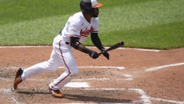 Jun 6, 2021; Baltimore, Maryland, USA; Baltimore Orioles center fielder Cedric Mullins (31) hits a double during the fourth inning against the Cleveland Indians at Oriole Park at Camden Yards. Mandatory Credit: Gregory Fisher-USA TODAY Sports