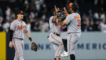 Aug 2, 2021; Bronx, New York, USA; Baltimore Orioles third baseman Maikel Franco (3) celebrates with center fielder Cedric Mullins (31) and right fielder Austin Hays (21) after their game against the New York Yankees at Yankee Stadium. Mandatory Credit: Vincent Carchietta-USA TODAY Sports