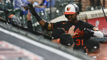 Sep 10, 2021; Baltimore, Maryland, USA; Baltimore Orioles center fielder Cedric Mullins (31) celebrates with teammates after hitting a first inning home run Toronto Blue Jays at Oriole Park at Camden Yards. Mandatory Credit: Tommy Gilligan-USA TODAY Sports