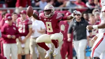 Nov 14, 2015; Tallahassee, FL, USA; Florida State Seminoles defensive back Jalen Ramsey celebrates a turnover against the North Carolina State Wolfpack at Doak Campbell Stadium. Mandatory Credit: Glenn Beil-USA TODAY Sports