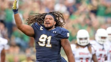 Sep 26, 2015; South Bend, IN, USA; Notre Dame Fighting Irish defensive lineman Sheldon Day (91) celebrates after a sack in the second quarter against the Massachusetts Minutemen at Notre Dame Stadium. Notre Dame won 62-27. Mandatory Credit: Matt Cashore-USA TODAY Sports