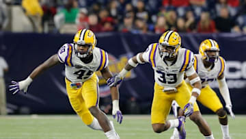 Dec 29, 2015; Houston, TX, USA; LSU Tigers defensive end Arden Key (49) and safety Jamal Adams (33) play defense against the Texas Tech Red Raiders at NRG Stadium. LSU won 56 to 27. Mandatory Credit: Thomas B. Shea-USA TODAY Sports