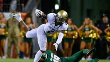 DENVER, CO - AUGUST 31: Wide receiver Laviska Shenault Jr. #2 of the Colorado Buffaloes gets tripped up by cornerback V.J. Banks #19 of the Colorado State Rams in the first quarter at Broncos Stadium at Mile High on August 31, 2018 in Denver, Colorado. (Photo by Joe Mahoney/Getty Images)