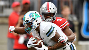 COLUMBUS, OH - SEPTEMBER 22: Terren Encalade #5 of the Tulane Green Wave catches a long pass in the second quarter as Jeffrey Okudah #1 of the Ohio State Buckeyes defends at Ohio Stadium on September 22, 2018 in Columbus, Ohio. (Photo by Jamie Sabau/Getty Images)