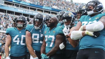 JACKSONVILLE, FL - NOVEMBER 18: Leonard Fournette #27 of the Jacksonville Jaguars celebrates with the Jacksonville Jaguars offense following a second half touchdown against the Pittsburgh Steelers at TIAA Bank Field on November 18, 2018 in Jacksonville, Florida. (Photo by Scott Halleran/Getty Images)