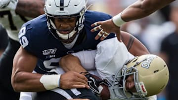 STATE COLLEGE, PA - AUGUST 31: Yetur Gross-Matos #99 of the Penn State Nittany Lions sacks Mason Petrino #8 of the Idaho Vandals during the first half at Beaver Stadium on August 31, 2019 in State College, Pennsylvania. (Photo by Scott Taetsch/Getty Images)