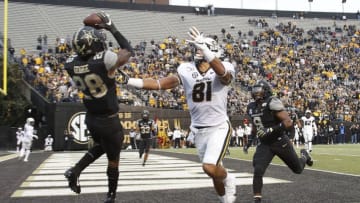 NASHVILLE, TENNESSEE - OCTOBER 19: Allan George #28 of the Vanderbilt Commodores makes an interception in the end zone over Albert Okwuegbunam #81 of the Missouri Tigers during the second half of a Vanderbilt 21-14 upset of the Missouri Tigers at Vanderbilt Stadium on October 19, 2019 in Nashville, Tennessee. (Photo by Frederick Breedon/Getty Images)