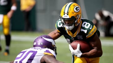 GREEN BAY, WI - SEPTEMBER 16: Randall Cobb #18 of the Green Bay Packers is tackled by Mackensie Alexander #20 of the Minnesota Vikings during the second quarter of a game at Lambeau Field on September 16, 2018 in Green Bay, Wisconsin. (Photo by Jonathan Daniel/Getty Images)