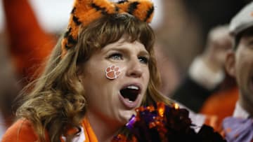 SANTA CLARA, CA - JANUARY 07: A Clemson Tigers fan cheers on her team against the Alabama Crimson Tide in the CFP National Championship presented by AT&T at Levi's Stadium on January 7, 2019 in Santa Clara, California. (Photo by Ezra Shaw/Getty Images)