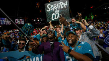 Devin Lloyd celebrates with Jacksonville Jaguars fans after being selected during round one of the 2022 NFL Draft on April 28, 2022 in Las Vegas, Nevada. (Photo by Kevin Sabitus/Getty Images)