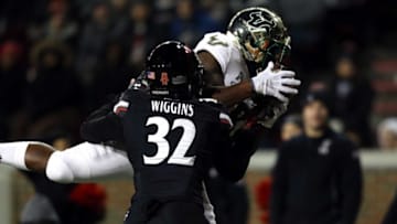 Nov 10, 2018; Cincinnati, OH, USA; South Florida Bulls wide receiver Tyre McCants (8) catches a pass for a touchdown against Cincinnati Bearcats safety James Wiggins (32) in the second half at Nippert Stadium. Mandatory Credit: Aaron Doster-USA TODAY Sports