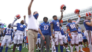 Nov 28, 2020; Gainesville, FL, USA; Florida Gators head coach Dan Mullen celebrates with his team after the Gators beat the Kentucky Wildcats at Ben Hill Griffin Stadium in Gainesville, Fla. Nov. 28, 2020. Mandatory Credit: Brad McClenny-USA TODAY NETWORK