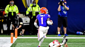 Dec 19, 2020; Atlanta, Georgia, USA; Florida Gators wide receiver Kadarius Toney (1) catches a touchdown pass against Alabama Crimson Tide defensive back Malachi Moore (13) during the first quarter in the SEC Championship at Mercedes-Benz Stadium. Mandatory Credit: Adam Hagy-USA TODAY Sports