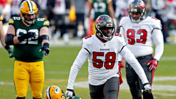 Jan 24, 2021; Green Bay, Wisconsin, USA; Tampa Bay Buccaneers outside linebacker Shaquil Barrett (58) reacts after sacking Green Bay Packers quarterback Aaron Rodgers (12) during the first quarter in the NFC Championship Game at Lambeau Field. Mandatory Credit: Jeff Hanisch-USA TODAY Sports