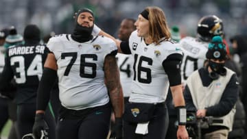 Jacksonville Jaguars quarterback Trevor Lawrence (16) and offensive tackle Will Richardson (76). Mandatory Credit: Vincent Carchietta-USA TODAY Sports
