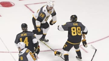 Jan 31, 2016; Nashville, TN, USA; Atlantic Division forward John Scott (28) of the Montreal Canadiens drops the gloves with Central Division forward Patrick Kane (88) of the Chicago Blackhawks during the 2016 NHL All Star Game at Bridgestone Arena. Mandatory Credit: Aaron Doster-USA TODAY Sports