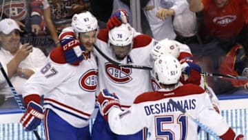 Dec 29, 2015; Sunrise, FL, USA; Montreal Canadiens left wing Max Pacioretty (67) celebrates his goal with defenseman P.K. Subban (76) , left wing Daniel Carr (43) and center David Desharnais (51) in the first period of a game against the Florida Panthers at BB&T Center. Mandatory Credit: Robert Mayer-USA TODAY Sports