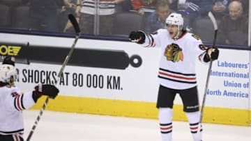 Jan 15, 2016; Toronto, Ontario, CAN; Chicago Blackhawks right wing Patrick Kane (88) celebrates his second goal of the game against the Toronto Maple Leafs at Air Canada Centre. Mandatory Credit: Tom Szczerbowski-USA TODAY Sports