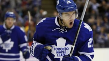 Nov 1, 2014; Toronto, Ontario, CAN; Toronto Maple Leafs forward James van Riemsdyk (21) reacts after scoring a goal against the Chicago Blackhawks during the second period at the Air Canada Centre. Mandatory Credit: John E. Sokolowski-USA TODAY Sports