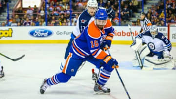 Feb 13, 2016; Edmonton, Alberta, CAN; Edmonton Oilers right wing Teddy Purcell (16) controls the puck against the Winnipeg Jets during the second period at Rexall Place. Mandatory Credit: Sergei Belski-USA TODAY Sports