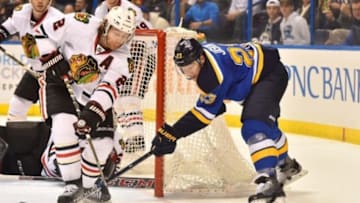 Mar 9, 2016; St. Louis, MO, USA; Chicago Blackhawks defenseman Duncan Keith (2) blocks the attack of St. Louis Blues right wing Dmitrij Jaskin (23) during the second period at Scottrade Center. Mandatory Credit: Jasen Vinlove-USA TODAY Sports