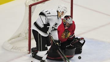 Mar 14, 2016; Chicago, IL, USA; Chicago Blackhawks goalie Corey Crawford (50) makes a save against Los Angeles Kings left wing Milan Lucic (17) during the second period at the United Center. Mandatory Credit: David Banks-USA TODAY Sports
