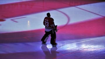 Mar 16, 2016; Chicago, IL, USA; Chicago Blackhawks goalie Scott Darling (33) stands during the national anthem before a game against the Philadelphia Flyers at the United Center. Mandatory Credit: David Banks-USA TODAY Sports