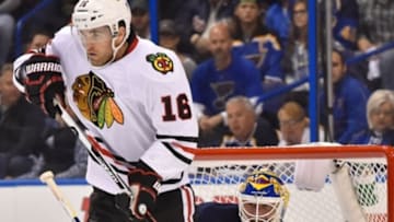 Apr 13, 2016; St. Louis, MO, USA; Chicago Blackhawks left wing Andrew Ladd (16) screens St. Louis Blues goalie Brian Elliott (1) during the first period in game one of the first round of the 2016 Stanley Cup Playoffs at Scottrade Center. Mandatory Credit: Jasen Vinlove-USA TODAY Sports