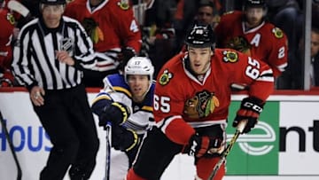 Apr 19, 2016; Chicago, IL, USA; St. Louis Blues left wing Jaden Schwartz (17) defends Chicago Blackhawks center Andrew Shaw (65) during the first period in game four of the first round of the 2016 Stanley Cup Playoffs at United Center. Mandatory Credit: David Banks-USA TODAY Sports