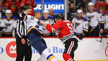 Apr 7, 2016; Chicago, IL, USA; St. Louis Blues right wing Ryan Reaves (75) and Chicago Blackhawks left wing Brandon Mashinter (53) fight during the second period at the United Center. Mandatory Credit: Dennis Wierzbicki-USA TODAY Sports