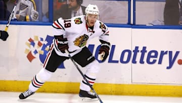 Apr 21, 2016; St. Louis, MO, USA; Chicago Blackhawks center Jonathan Toews (19) skates with the puck during game five of the first round of the 2016 Stanley Cup Playoffs against the St. Louis Blues at Scottrade Center. The Blackhawks won the game 4-3 in double overtime. Mandatory Credit: Billy Hurst-USA TODAY Sports