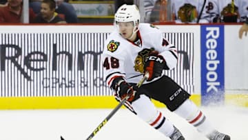 Sep 23, 2015; Detroit, MI, USA; Chicago Blackhawks center Vincent Hinostroza (48) skates with the puck in the second period against the Detroit Red Wings at Joe Louis Arena. Mandatory Credit: Rick Osentoski-USA TODAY Sports
