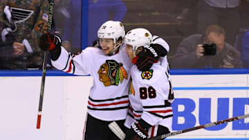 Apr 15, 2016; St. Louis, MO, USA; Chicago Blackhawks left wing Artemi Panarin (72) celebrates with Patrick Kane (88) after scoring the game-winning goal during the third period in game two of the first round of the 2016 Stanley Cup Playoffs against the St. Louis Blues at Scottrade Center. The Blackhawks won the game 3-2. Mandatory Credit: Billy Hurst-USA TODAY Sports