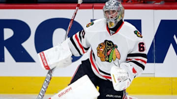 Sep 25, 2015; Montreal, Quebec, CAN; Chicago Blackhawks goalie Mac Carruth (60) stretches during the warmup period before the game against the Montreal Canadiens at the Bell Centre. Mandatory Credit: Eric Bolte-USA TODAY Sports