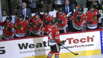 Apr 5, 2016; Chicago, IL, USA; Chicago Blackhawks right wing Richard Panik (14) celebrates with teammates after scoring a goal in the first period against the Arizona Coyotes at the United Center. Mandatory Credit: Matt Marton-USA TODAY Sports