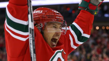 Feb 16, 2016; Newark, NJ, USA; New Jersey Devils right wing Jordin Tootoo (22) celebrates his goal during the third period against the Philadelphia Flyers at Prudential Center. The Flyers defeated the Devils 6-3. Mandatory Credit: Ed Mulholland-USA TODAY Sports