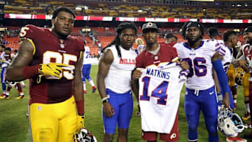 Aug 26, 2016; Landover, MD, USA; (L-R) Washington Redskins defensive end Corey Crawford (95), Buffalo Bills wide receiver Sammy Watkins (14), Redskins cornerback Bashaud Breeland (26), and Bills defensive back Jonathan Meeks (36) pose for a picture after their game at FedEx Field. The Redskins won 21-16. Mandatory Credit: Geoff Burke-USA TODAY Sports