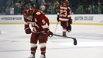 Apr 7, 2016; Tampa, FL, USA; Denver Pioneers forward Gabe Levin (9) reacts and looks down after they lose to the North Dakota Fighting Hawks at the semifinals of the 2016 Frozen Four college ice hockey tournament at Amalie Arena. North Dakota Fighting Hawks defeated the Denver Pioneers 4-2. Mandatory Credit: Kim Klement-USA TODAY Sports