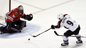 Nov 3, 2016; Chicago, IL, USA; Colorado Avalanche center Matt Duchene (9) shoots on Chicago Blackhawks goalie Corey Crawford (50) during the second period at the United Center. Mandatory Credit: David Banks-USA TODAY Sports