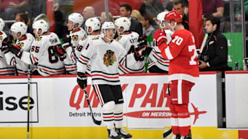 DETROIT, MI - SEPTEMBER 17: Chicago Blackhawks left wing Dominik Kubalik (8) celebrates his goal with teammates during the second period of a preseason game between the Chicago Blackhawks and the Detroit Red Wings on September 17, 2019, at Little Caesars Arena in Detroit, MI. (Photo by Roy K. Miller/Icon Sportswire via Getty Images)