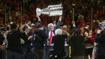 Chicago Blackhawks head coach Joel Quenneville celebrates with the Stanley Cup after the team defeated the Tampa Bay Lightning in Game 6 of the Stanley Cup Final on Monday, June 15, 2015, at the United Center in Chicago. (Brian Cassella/Chicago Tribune/Tribune News Service via Getty Images)