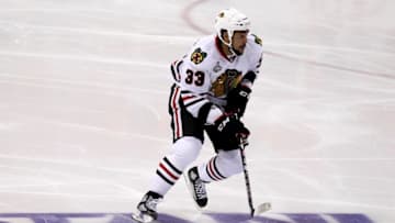 Dustin Byfuglien #33, Chicago Blackhawks (Photo by Andre Ringuette/Getty Images)