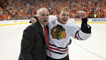 CHICAGO - JUNE 09: Chicago Blackhawks Head Coach Joel Quenneville and Patrick Kane #88 celebrate after Kane scored the winning goal against the Philadelphia Flyers to win the Stanley Cup 4-3 in overtime, at Game Six of the 2010 Stanley Cup Finals at the Wachovia Center on June 9, 2010 in Philadelphia, Pennsylvania. (Photo by Bill Smith/NHLI via Getty Images)