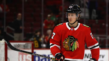 CHICAGO, IL - SEPTEMBER 25: Adam Boqvist #27 of the Chicago Blackhawks participates in warm-ups before a preseason game against the Detroit Red Wings at the United Center on September 25, 2018 in Chicago, Illinois. (Photo by Jonathan Daniel/Getty Images)