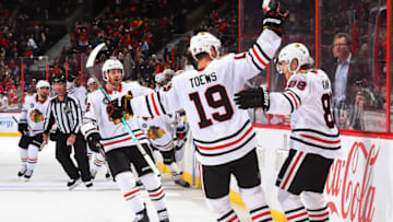 OTTAWA, ON - OCTOBER 4: Patrick Kane #88 of the Chicago Blackhawks celebrates with teammate Jonathan Toews #19 after scoring an overtime goal on the Ottawa Senators at Canadian Tire Centre on October 4, 2018 in Ottawa, Ontario, Canada. (Photo by Andrea Cardin/NHLI via Getty Images)