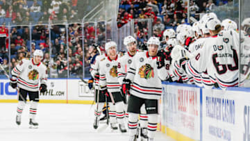 BUFFALO, NY - FEBRUARY 01: Chicago Blackhawks center Drake Caggiula (91) celebrates goal with Blackhawks teamates during the Chicago Blackhawks and Buffalo Sabres NHL game on February 1, 2019, at KeyBank Center in Buffalo, NY. (Photo by John Crouch/Icon Sportswire via Getty Images)